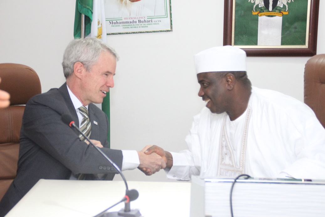 TALKING FOREIGN INVESTMENT: Sokoto State Governor, Aminu Waziri Tambuwal, with the Country Mission Director of the US Agency for International Development (USAID), Mr. Michael Harvey, at a Business Opportunity Forum organised by Sokoto State Government in Abuja
