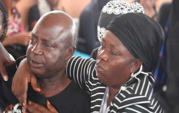 Mr-Anekwe-being-consoled-by-a-sympathiser-600x380